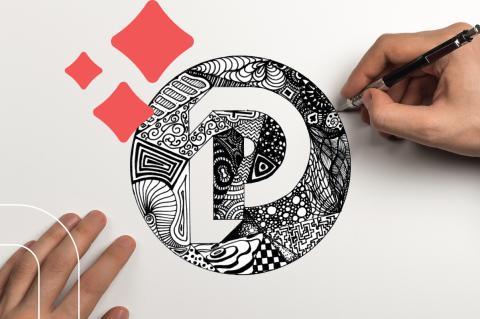 a hand finishes a Zentangle version of the PPL logo