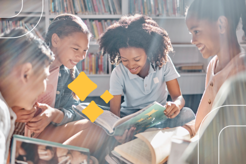 tweens read together in sunny library