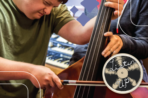 a person with intellectual differences plays the upright bass