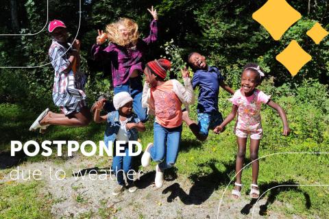 kids jump for joy hiking in nature - text overlay Postponed due to weather