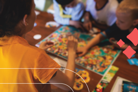 kids play a board game together