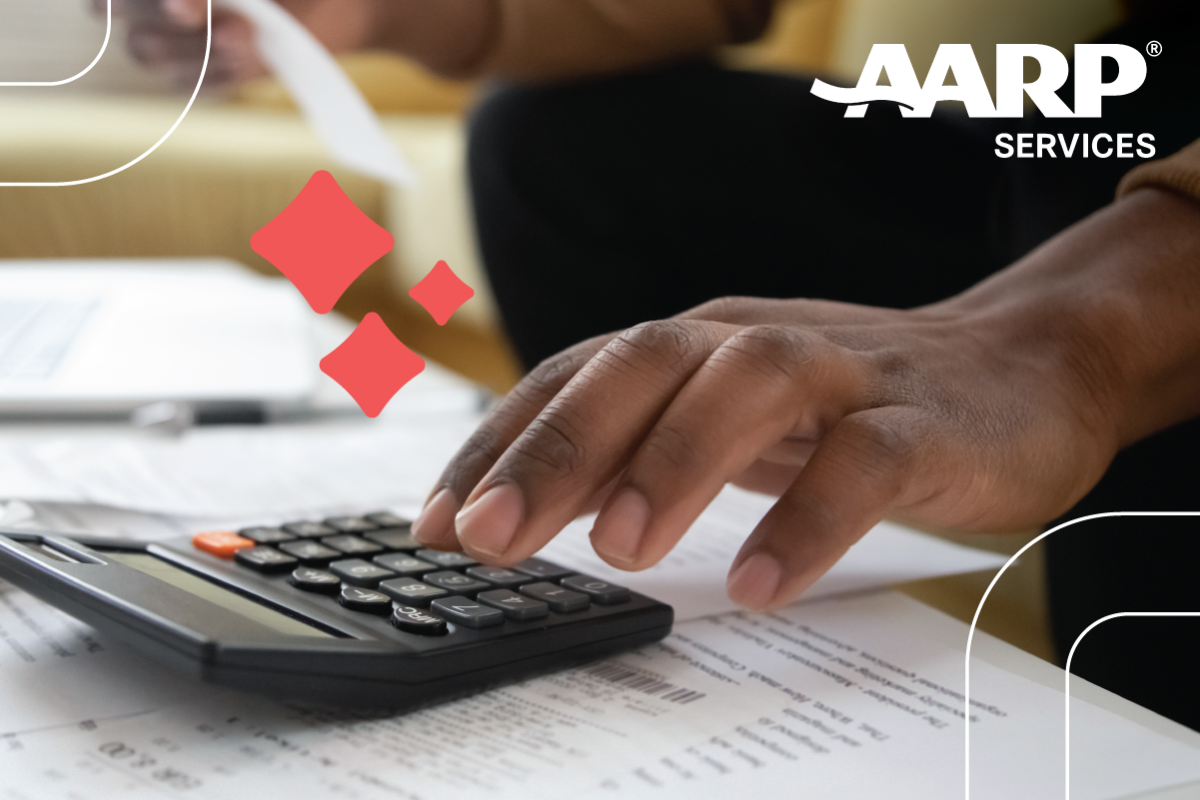 hand enters tax information on a calculator